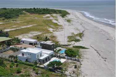 Aerial of beachfront property with swimming pool and direct beach access Punta Chame