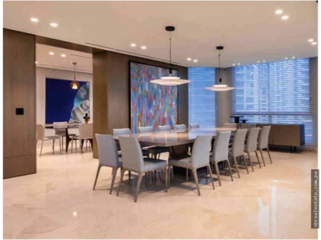 Modern bathroom with marble finishes, glass shower and ocean views at Pacific Point Punta Pacifica