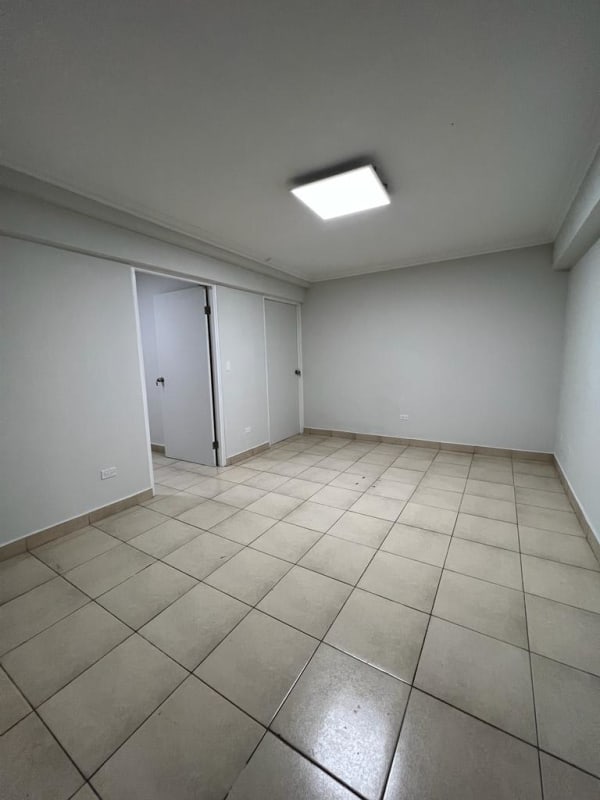 Bright open interior commercial space with ceramic floors and minimalist design in Galerías Alvear Via Argentina Panama City