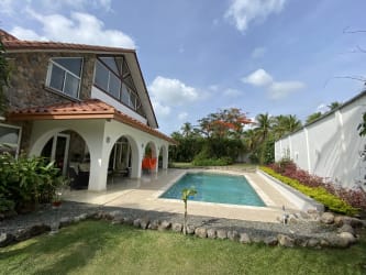 Covered outdoor terrace overlooking private swimming pool luxury Punta Barco house