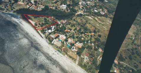 Open green beachfront land with ocean view in exclusive Punta Barco Panama community