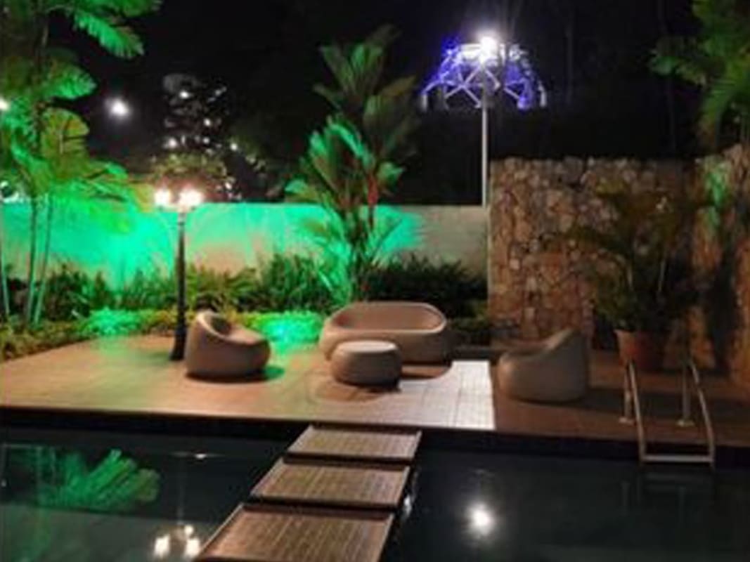 Kitchen with granite countertops, wooden cabinets, gas stove PH Oceania El Dorado Panama