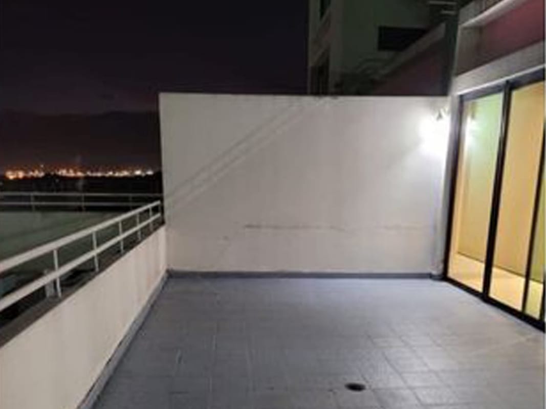 Dining room with LED ceiling lights and cushioned chairs in PH Oceania Panama