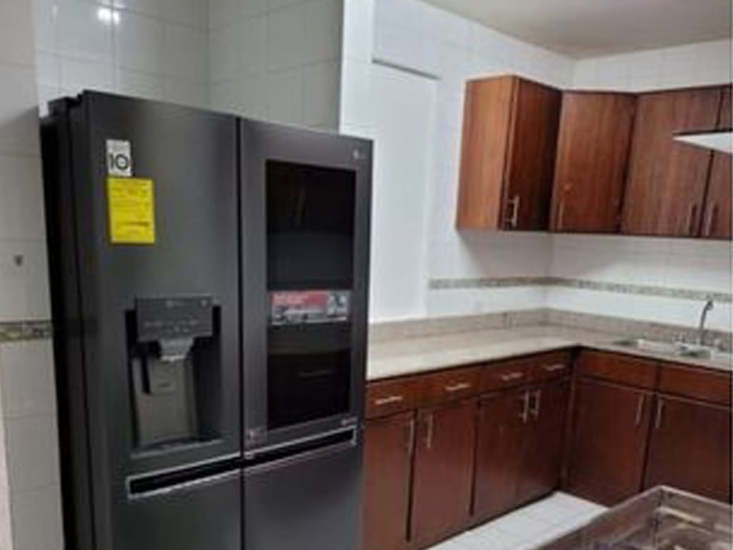 Modern swimming pool with night lighting and tropical landscaping PH Oceania Panama