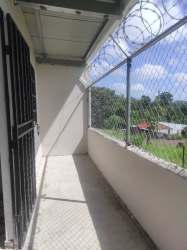 Private balcony with fencing and neighborhood views Barrio Balboa apartment La Chorrera Panama