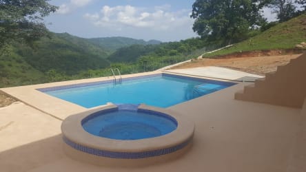 Private estate home beige facade lush forest backdrop pool Bejuco Sorá Chame