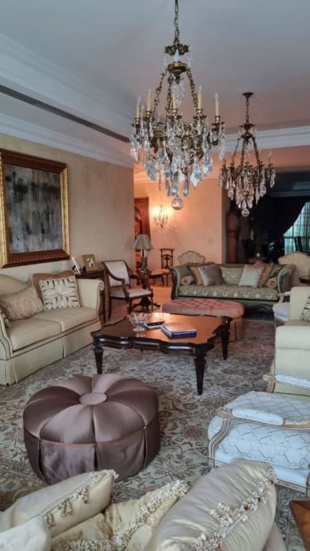 Formal luxury living room with chandeliers, ocean view windows in Bellagio Punta Pacifica Panama