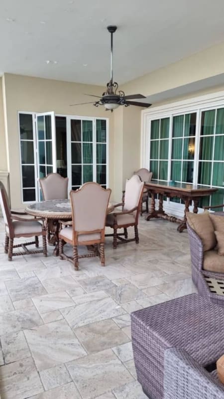 Outdoor covered patio with seating and dining areas in Bellagio Tower Punta Pacifica Panama