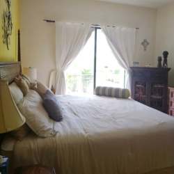 Master bedroom with view of golf course, en-suite bath, furnished at Buenaventura Panama