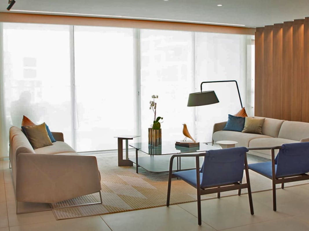 Bright living dining area leading to ocean view balcony in PH Riviera del Golf Coco del Mar