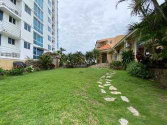 Aerial view beachfront estate with pool and gardens in Playa Corona Panama