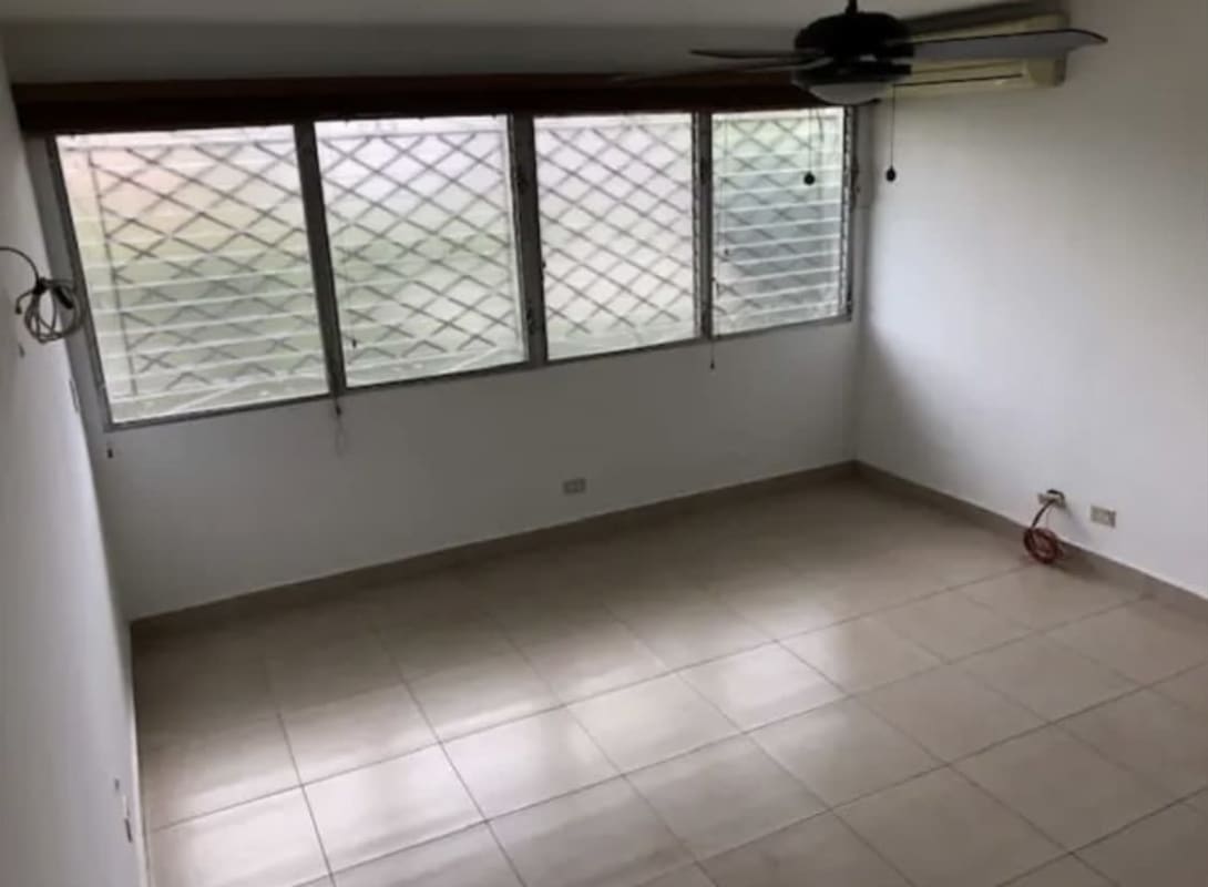 Bedroom with built-in wardrobe, tiled floors, ceiling fan, in El Dorado Los Angeles Panama