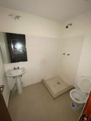 Contemporary bathroom with glass shower and vanity River Valley Panama Pacifico condo