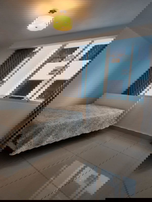 Stylish bathroom with beige tiles, glass enclosed shower PH Highland View Panama