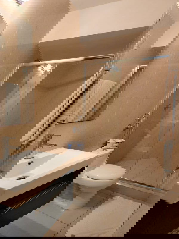 Minimalist bedroom with large windows and urban views PH Highland View Panama