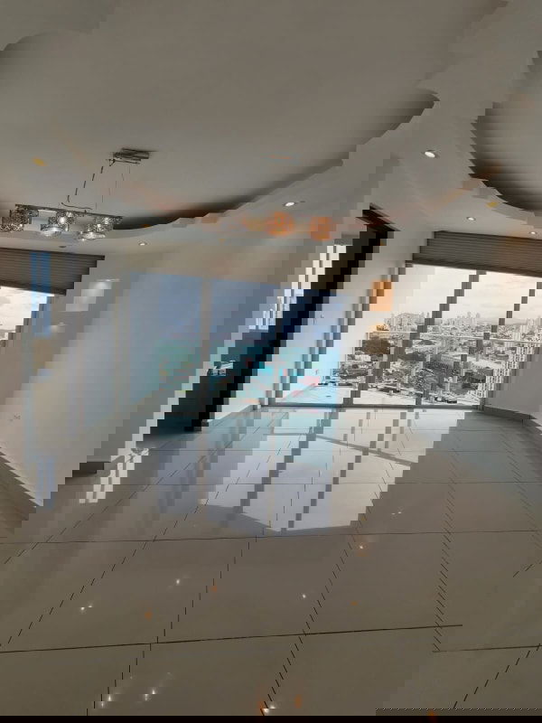 Luxury master bathroom with double sinks, bathtub, and skyline view PH Highland View Panama City