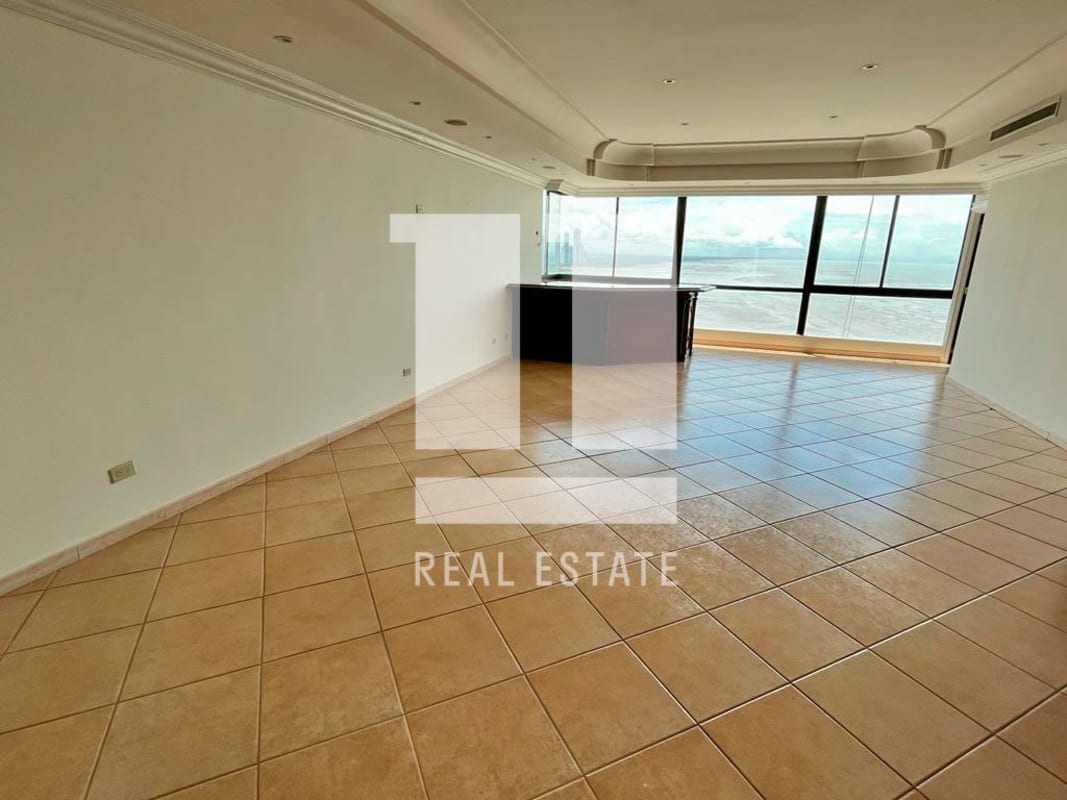 Elegant master bathroom with red marble double vanity, soaking tub, glass shower enclosure PH Palazzo Coco del Mar Panama