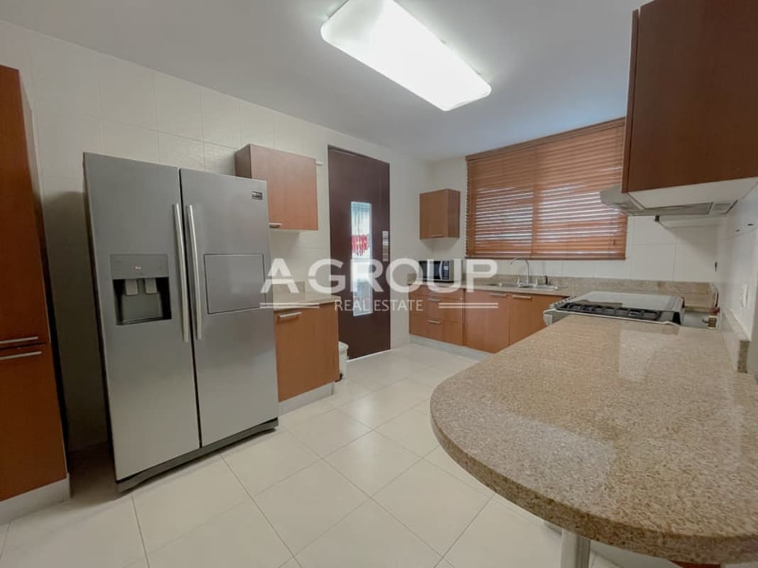 Kitchen with stainless appliances, granite countertops PH Soho Tower Costa del Este Panama