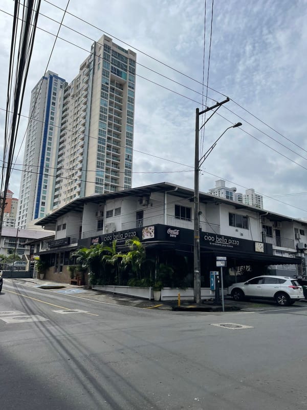 Two-story commercial complex with retail stores and apartments at Calle 71 and Matilde Obarrio in Panama City