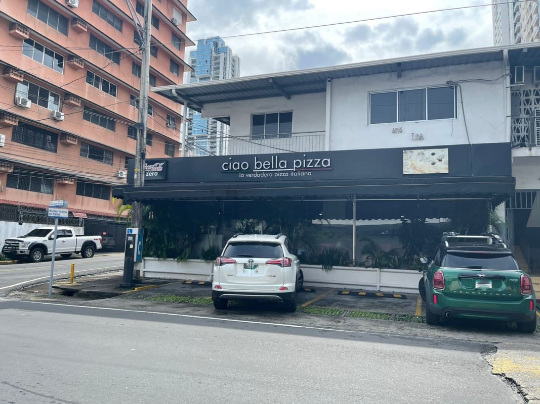 Street view of commercial mixed-use building and modern towers Obarrio San Francisco Panama