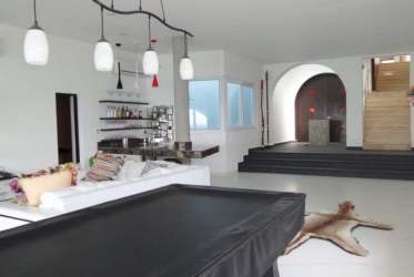 Game room with bar, pool table, modern furnishings at Vistamar villa San Carlos Panama