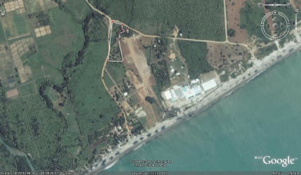 Aerial view of coastline, forest, resorts, prime beachfront development land near Buenaventura Panama