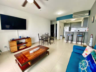 Bedroom with queen bed, AC, ceiling fan, ocean views in Playa Blanca Resort Panama