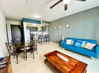 Bright living and dining area with ocean-themed decor PH Ocean Two Playa Blanca Panama