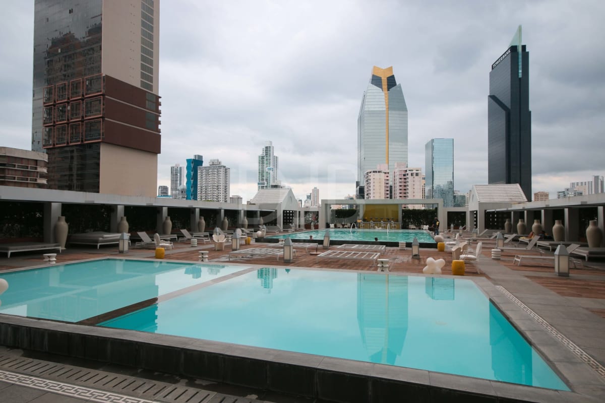 Luxury rooftop pool and sun deck overlooking Panama City skyline and coast at PH BICSA Tower