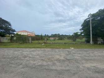 Vacant fenced flat land ideal for development located close to Coronado retail