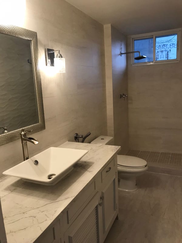 Bright bathroom with window, walk-in shower at PH Florida Obarrio Panama