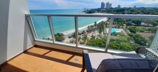 Oceanfront balcony with glass railing and Pacific view at Royal Palm Playa Malibu Panama