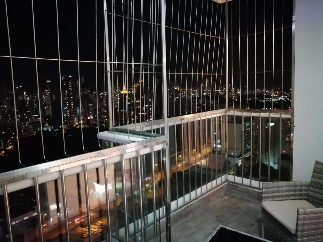 Nighttime skyline view from secured balcony in PH Pacific Park Plaza Edison Park Panama