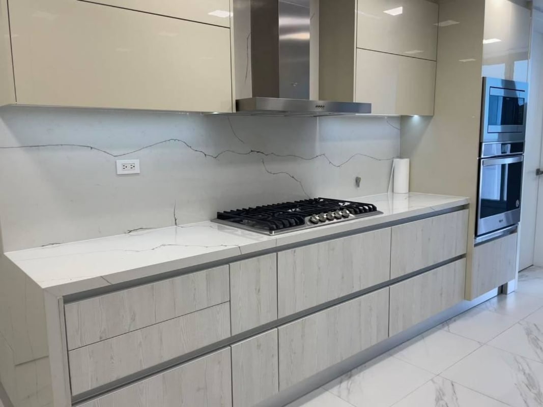 Marble kitchen with gas cooktop and built-in oven Q Tower Punta Pacifica Panama