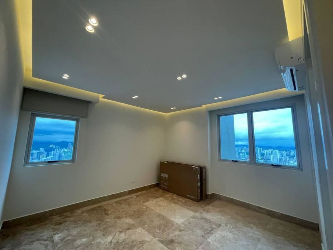 Modern bedroom with marble floor, floor-to-ceiling windows Punta Pacifica