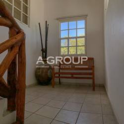 Large breezy dining area with rustic wood ceiling and tropical views in Coronado Panama