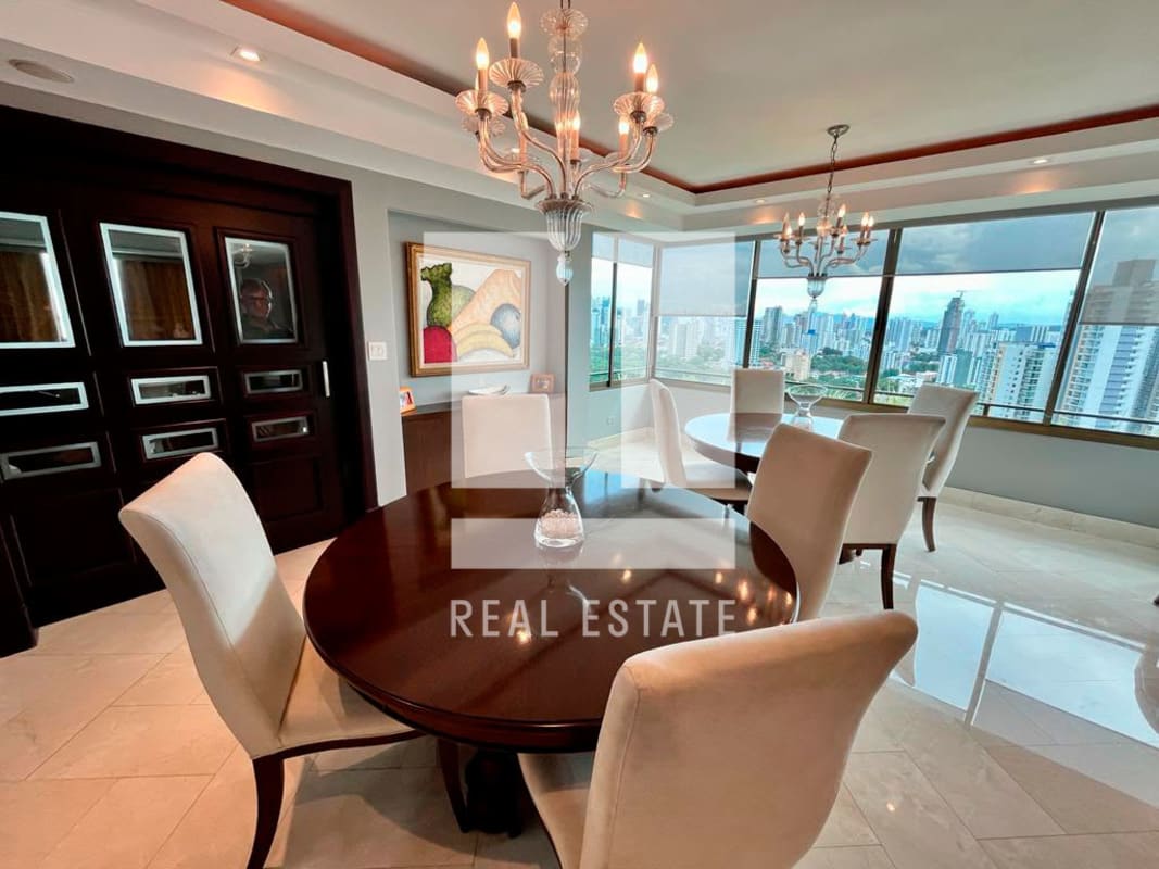 Grand entrance foyer with marble flooring and ornate finishes at PH Golf Tower penthouse Panama