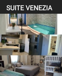 Bathroom with walk-in shower, marble tile, pedestal sink at Suite Venezia near Coronado Beach Panama