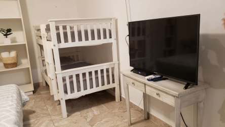 Outdoor terrace patio area with BBQ and garden near plunge pool at Suite Venezia Coronado Panama