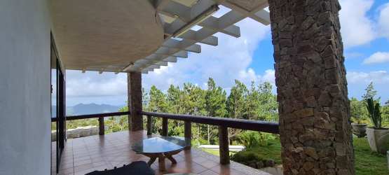 Patio with pergola, tiled floor, mountain vista Altos del María Panama villa for sale