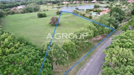 Triangular shaped large lot bordered by lake and trees within Buenaventura Resort Panama