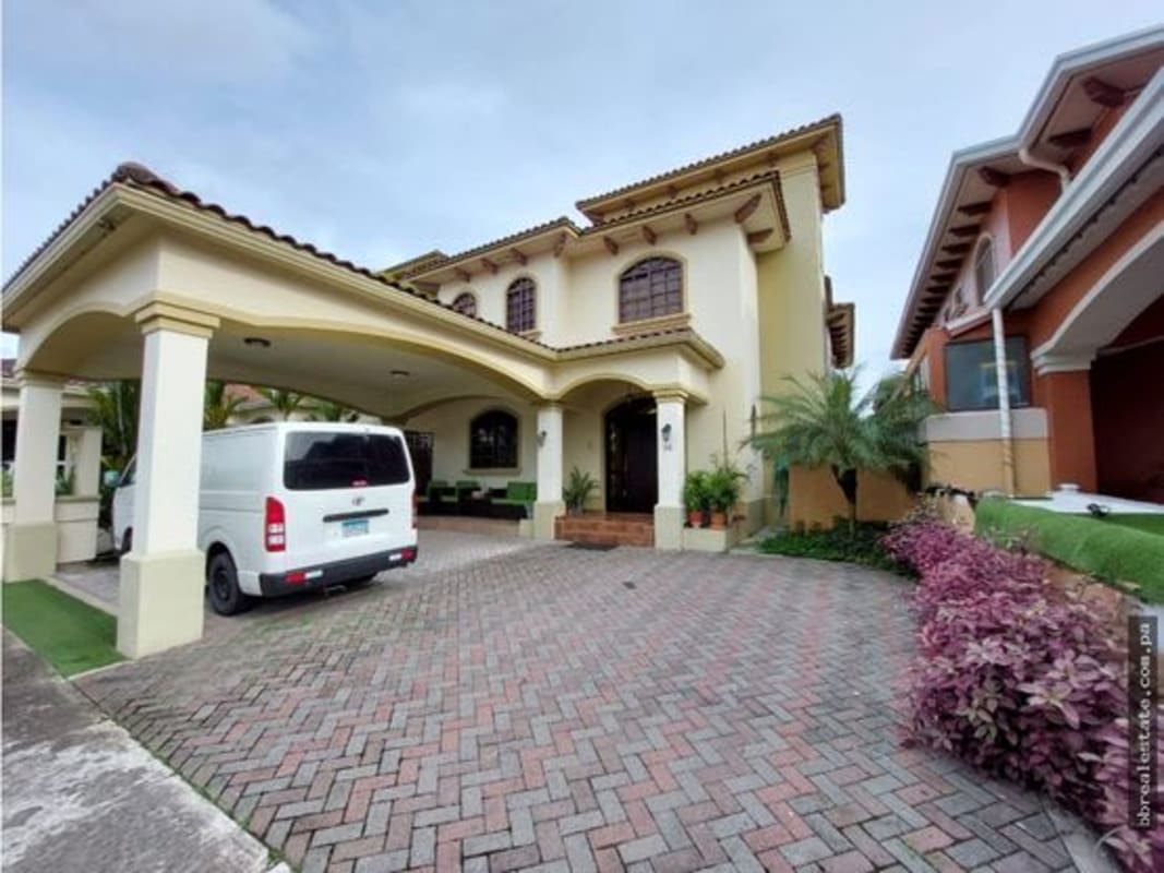 Bright open living and dining area with contemporary decor and large windows in Residencial El Doral Costa Sur