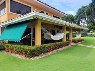Dedicated wine cellar with arches, brick, wood features inside luxury golf estate Panama