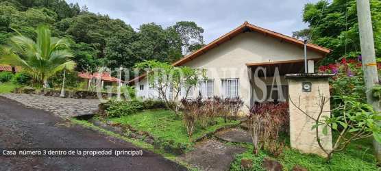 Private outdoor pool with mountain views and lush vegetation in Altos del María community Panama