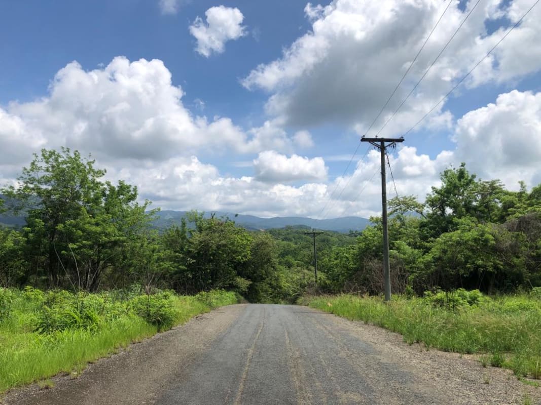 Rural paved road with access to mountain land in Altos de Cerro Azul Panama
