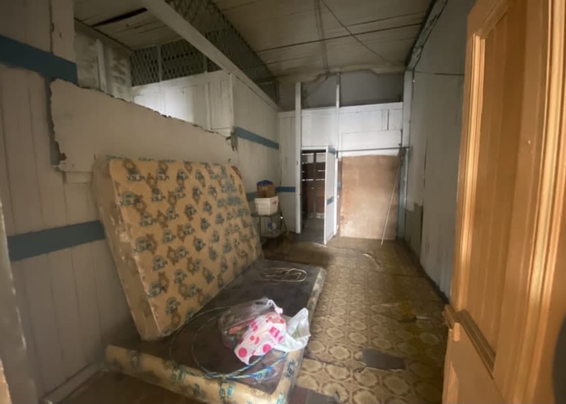 Vintage bedroom with high ceilings and renovation needs in Casco Viejo townhouse Panama