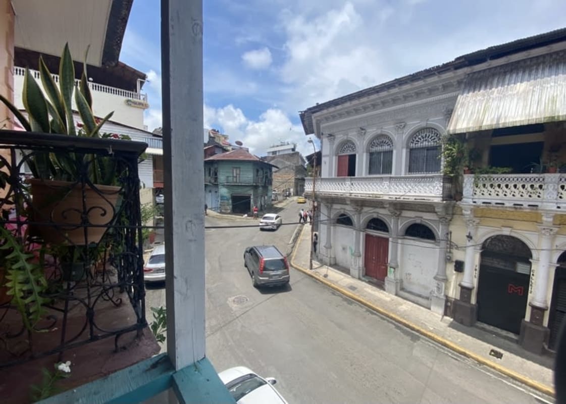 Colorful colonial facades seen from balcony in Casco Viejo historic district