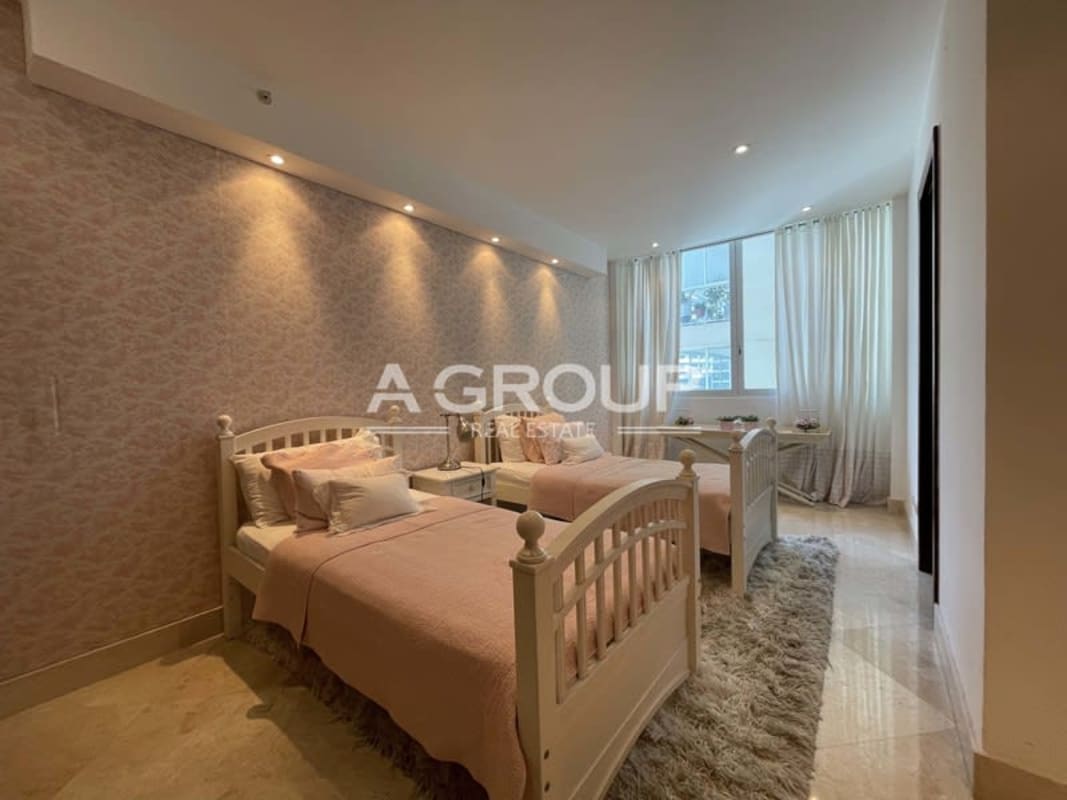 Elegant dining room with chandelier and ocean views PH The Point Punta Paitilla Panama