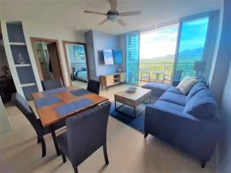 Queen bed, ocean view, modern furnished master bedroom Royal Palm Condo Panama