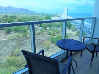 Modern kitchen with stainless appliances, quartz counters Royal Palm Condo Nueva Gorgona beachfront rental